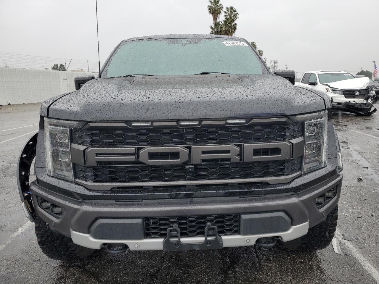 2023 Ford F-150 VIN 1FTFW1RG6PFA01658 Copart auction photo, side / front end damage thumbnail 5