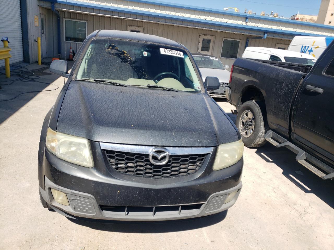 2009 Mazda Tribute VIN 4F2CZ02749KM03106 Copart auction photo, normal wear damage thumbnail 5