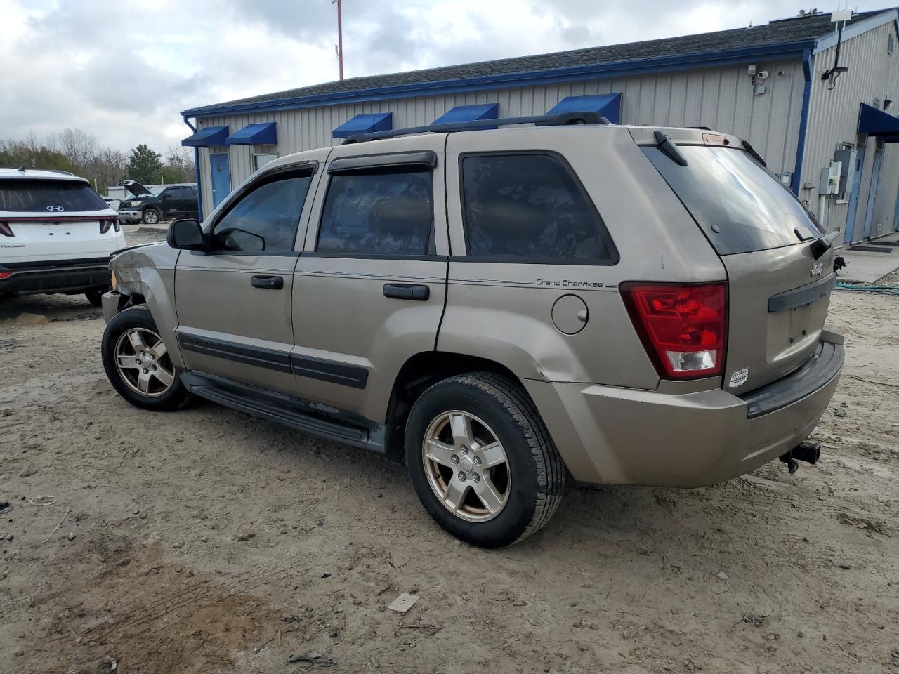 2005 Jeep Grand Cherokee VIN 1J4GS48K25C557661 Copart auction photo, front end / side damage thumbnail 2