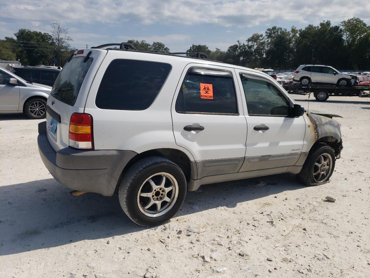 2002 Ford Escape VIN 1FMYU011X2KB24469 Copart auction photo, burn / minor dent/scratches damage thumbnail 3