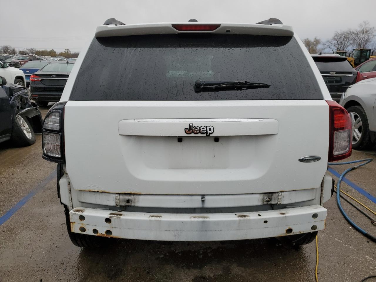 2014 Jeep Compass VIN 1C4NJCEB1ED764373 Copart auction photo, rear end damage thumbnail 6