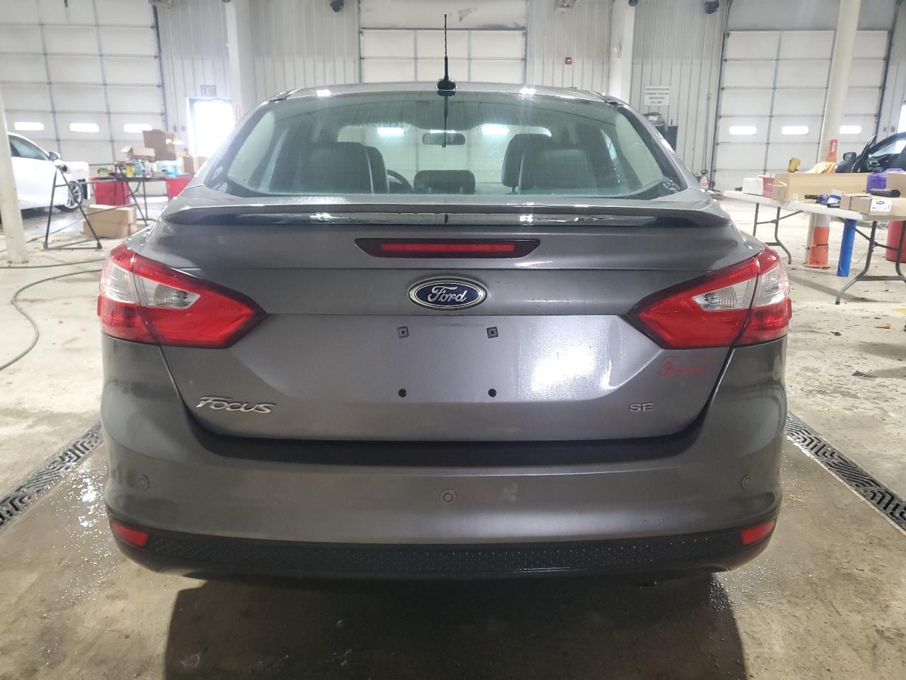 2014 Ford Focus VIN 1FADP3F24EL415759 Copart auction photo, rear end damage thumbnail 6