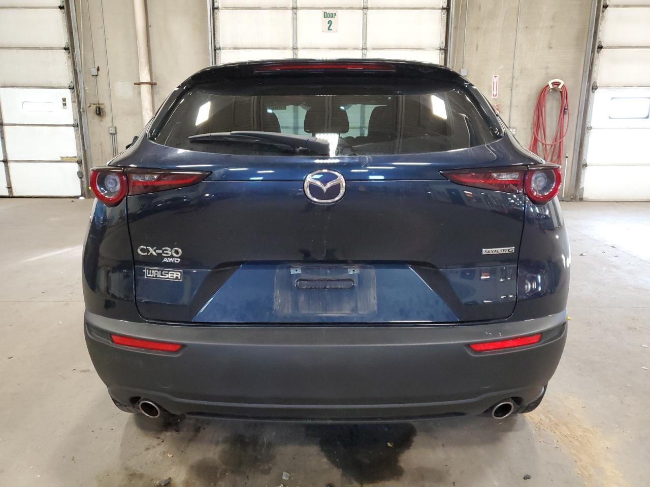 2021 Mazda CX-30 VIN 3MVDMBBL1MM255881 Copart auction photo, side / front end damage thumbnail 6