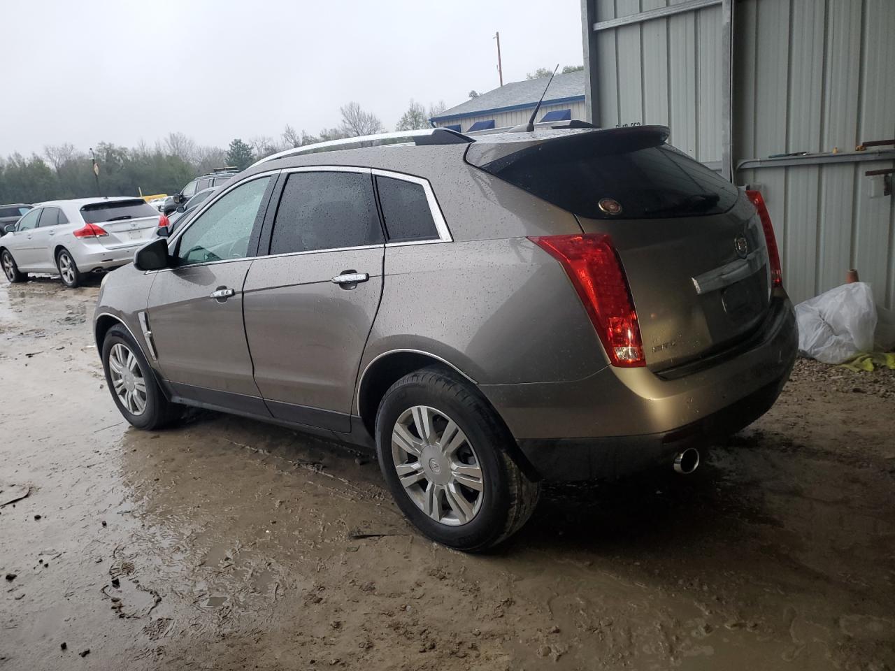 2012 Cadillac SRX VIN 3GYFNBE37CS564231 Copart auction photo, rear end damage thumbnail 2