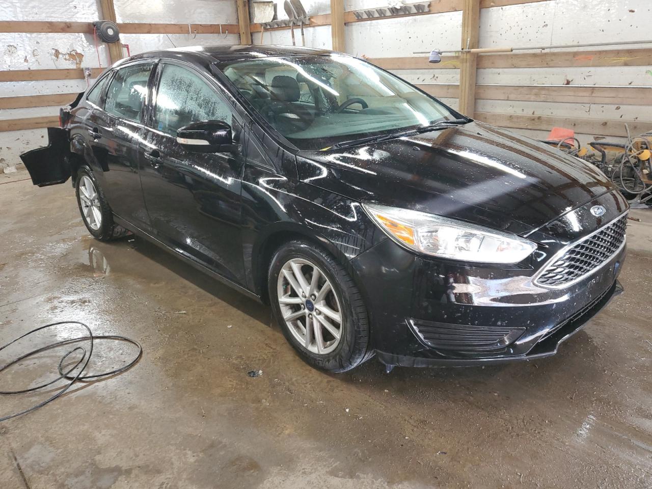 2016 Ford Focus VIN 1FADP3F26GL274454 Copart auction photo, rear end / minor dent/scratches damage thumbnail 4
