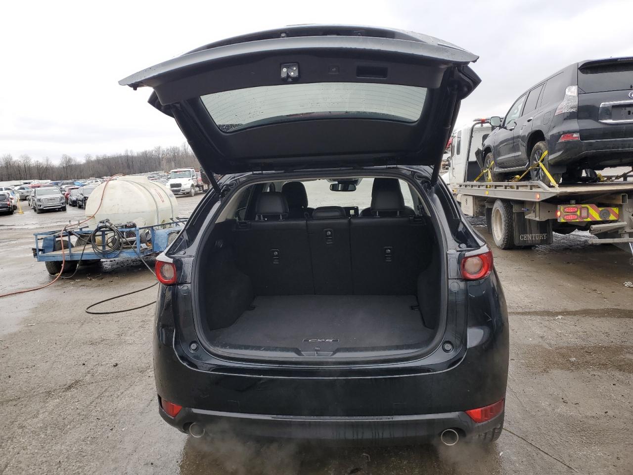 2021 Mazda CX-5 VIN JM3KFBCMXM0436997 Copart auction photo, front end / side damage thumbnail 6