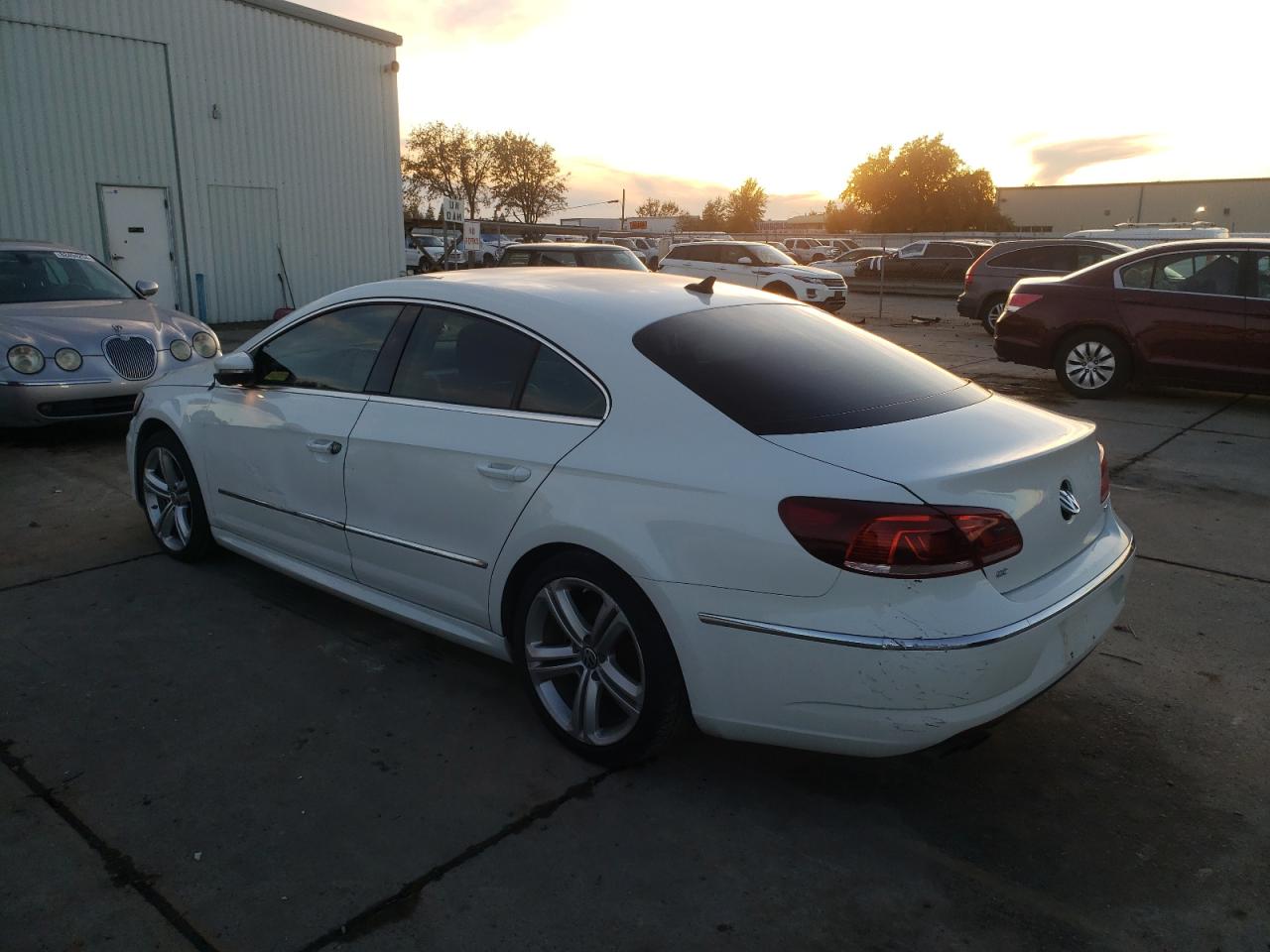 2016 Volkswagen Passat CC VIN WVWBP7AN5GE514219 Copart auction photo, side / front end damage thumbnail 2