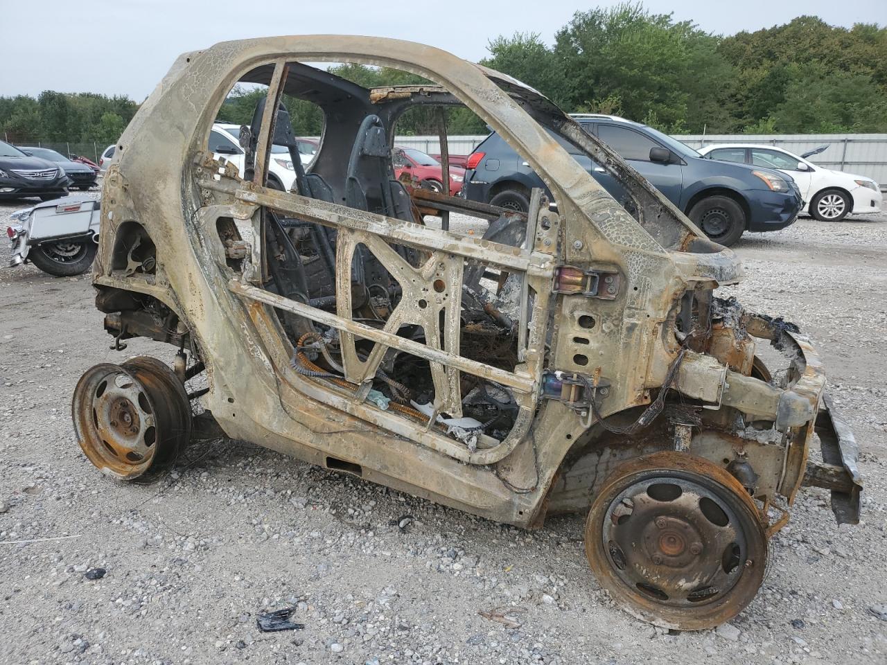 2015 Smart Fortwo VIN WMEEJ3BA7FK794570 Copart auction photo, burn damage thumbnail 4