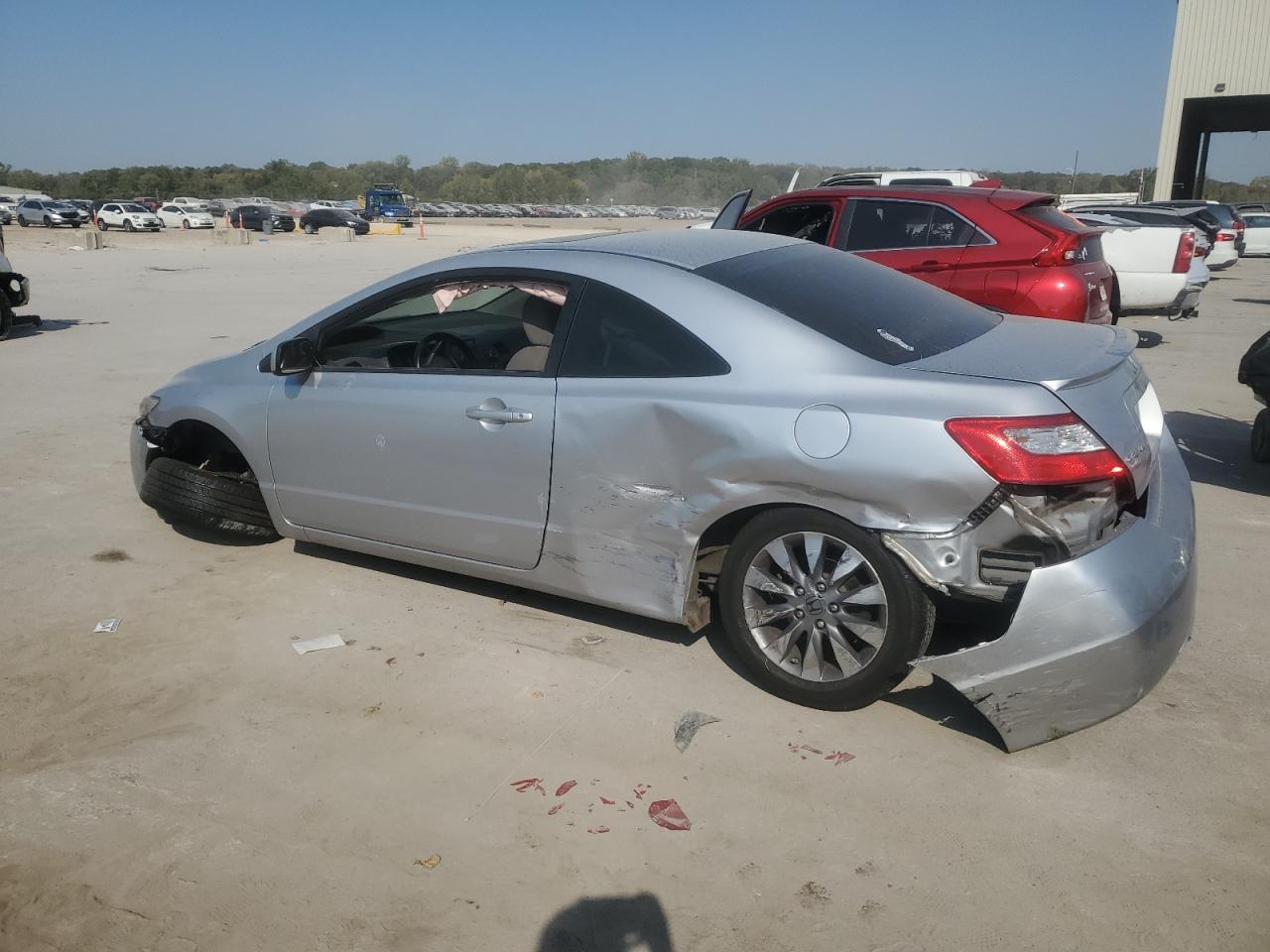 2009 Honda Civic VIN 2HGFG128X9H520585 Copart auction photo, side / front end damage thumbnail 2