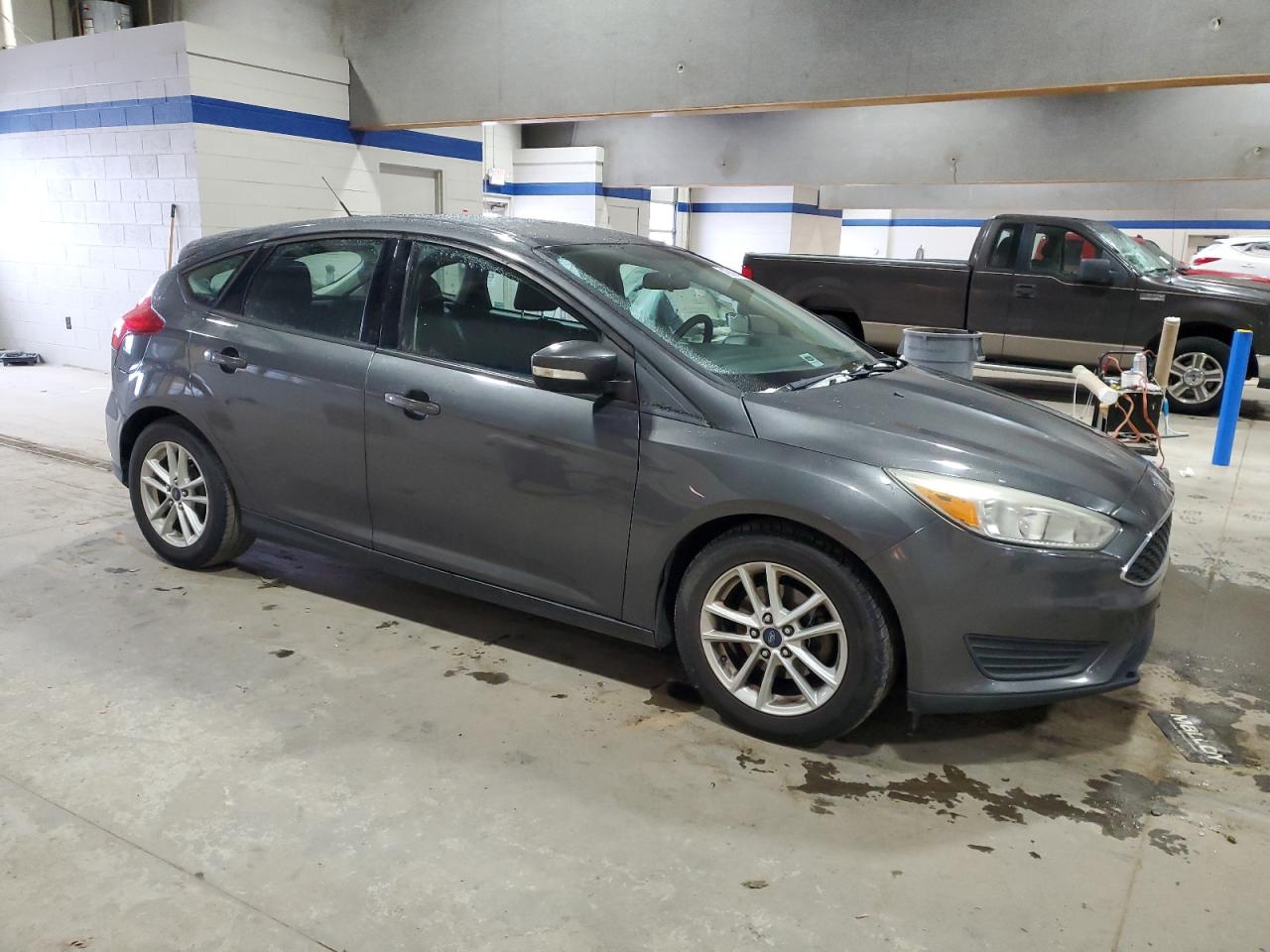2015 Ford Focus VIN 1FADP3K29FL216083 Copart auction photo, mechanical damage thumbnail 4
