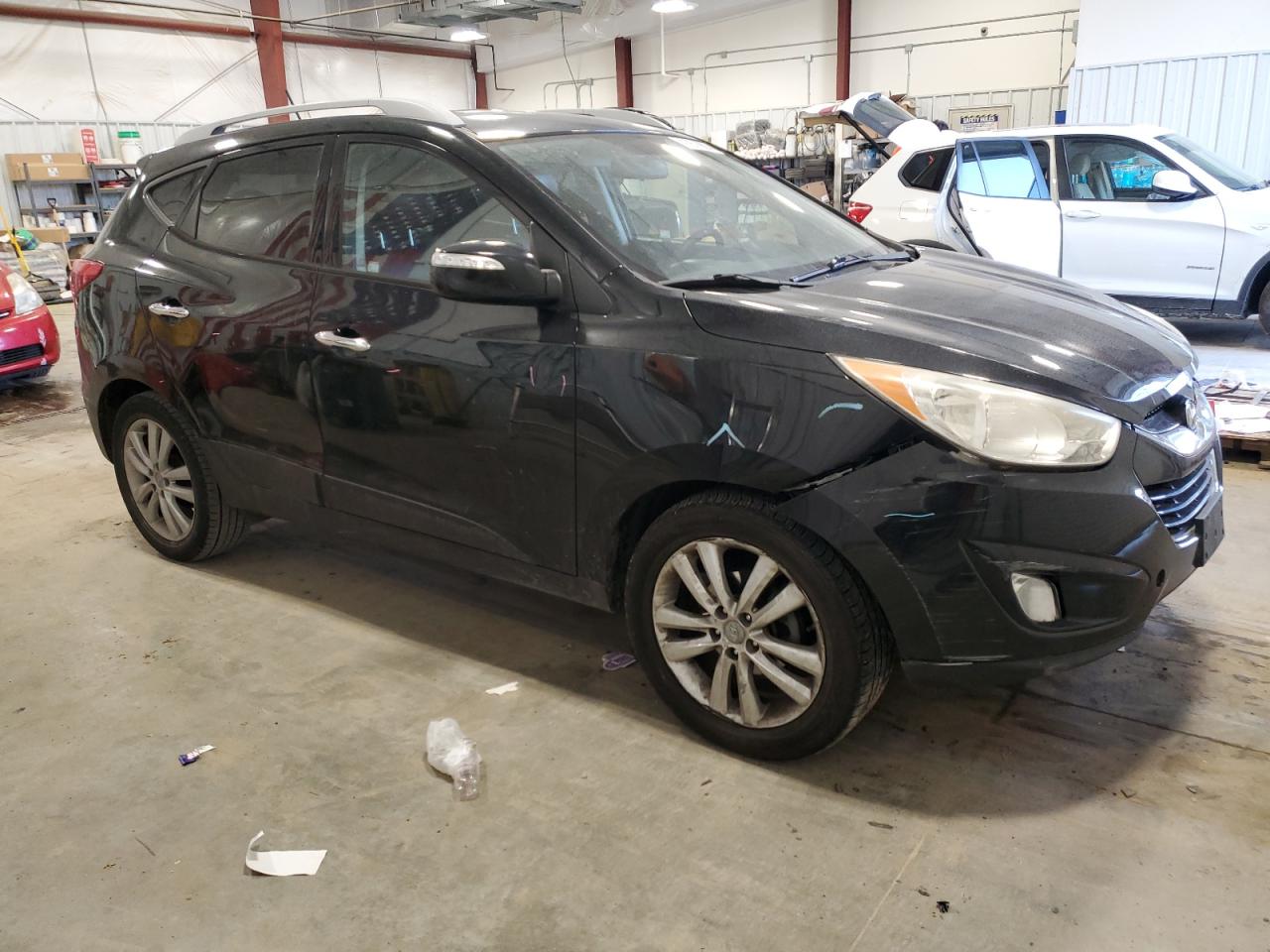 2010 Hyundai Tucson VIN KM8JU3AC8AU093004 Copart auction photo, front end / all over damage thumbnail 4