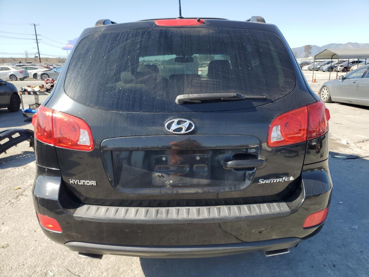 2009 Hyundai Santa Fe VIN 5NMSH13E69H321312 Copart auction photo, front end / rear end damage thumbnail 6