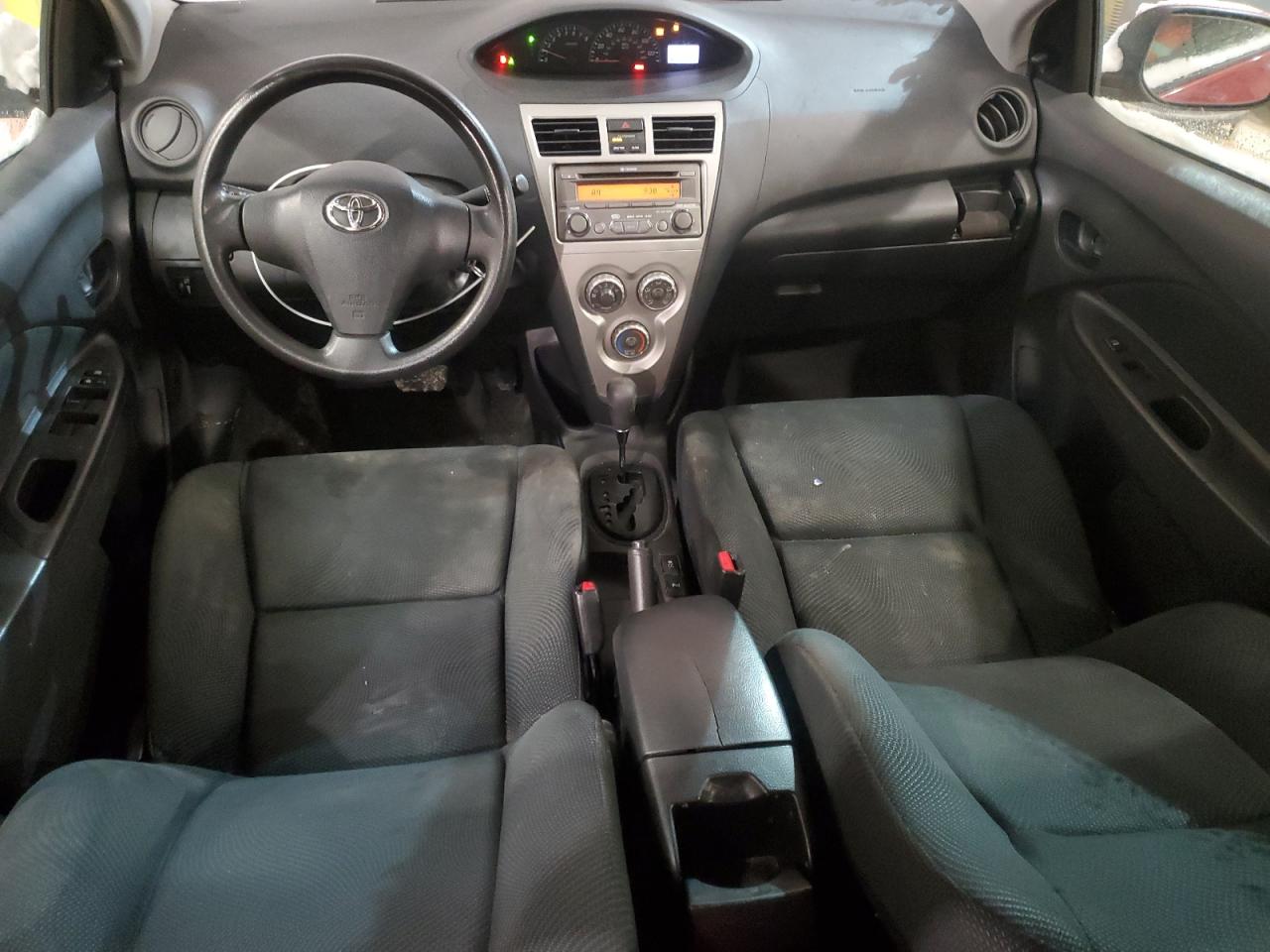 2012 Toyota Yaris VIN JTDBT4K34CL037411 Copart auction photo, front end / hail damage thumbnail 8