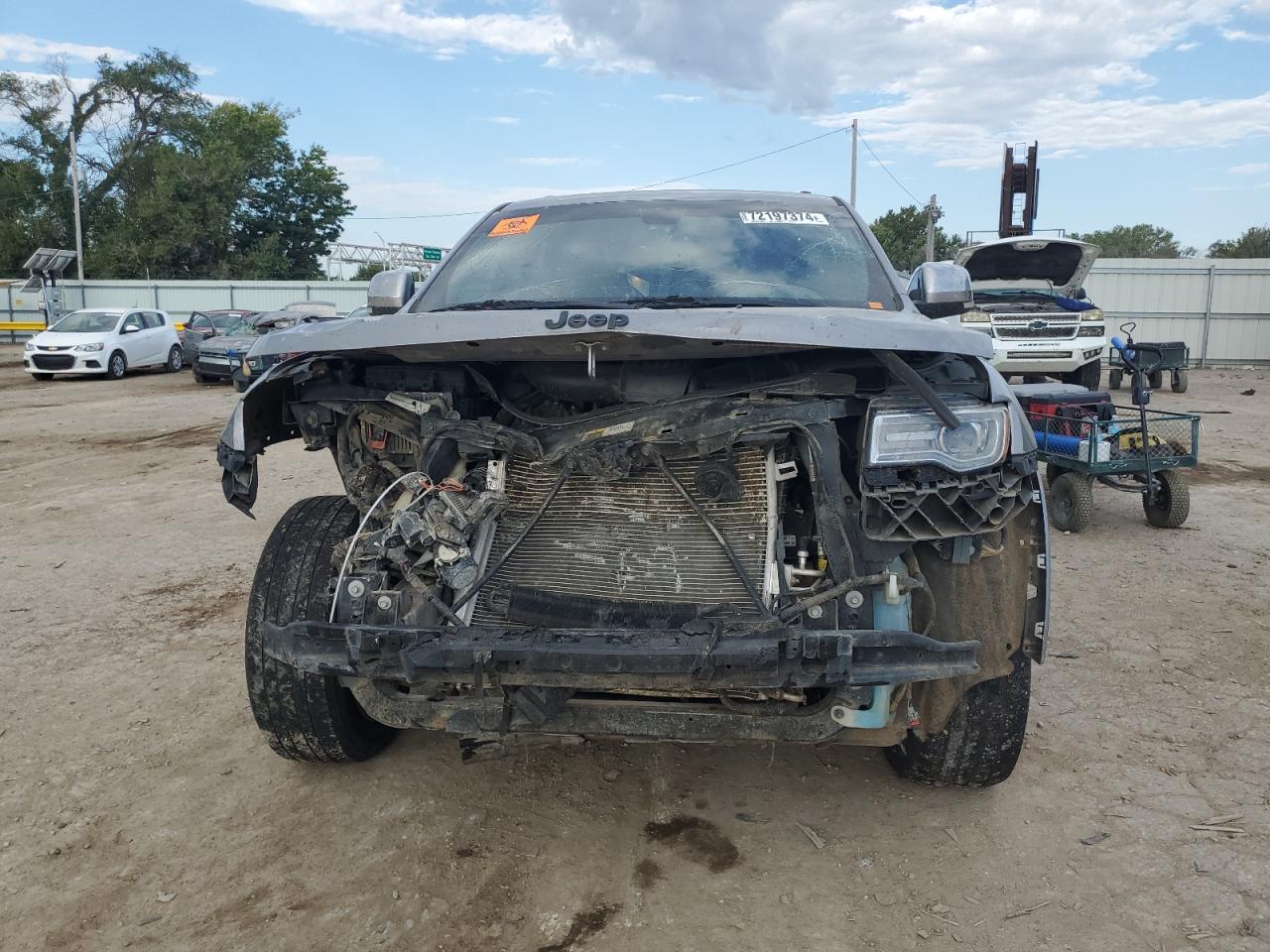 2015 Jeep Grand Cherokee VIN 1C4RJFBG5FC865605 Copart auction photo, front end / top/roof damage thumbnail 5