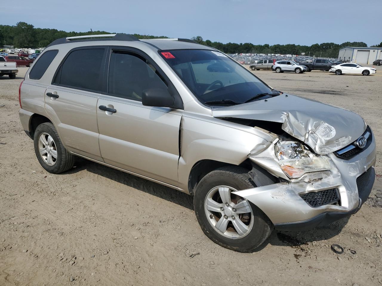 2009 KIA Sportage VIN KNDJF724297593909 Copart auction photo, front end / side damage thumbnail 4