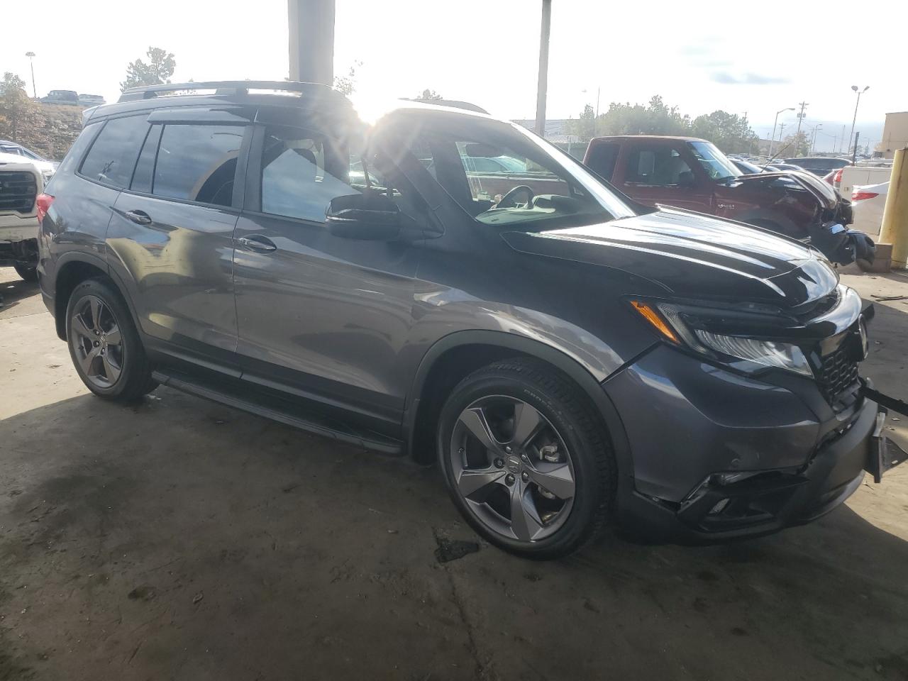 2021 Honda Passport VIN 5FNYF7H97MB012926 Copart auction photo, front end damage thumbnail 4
