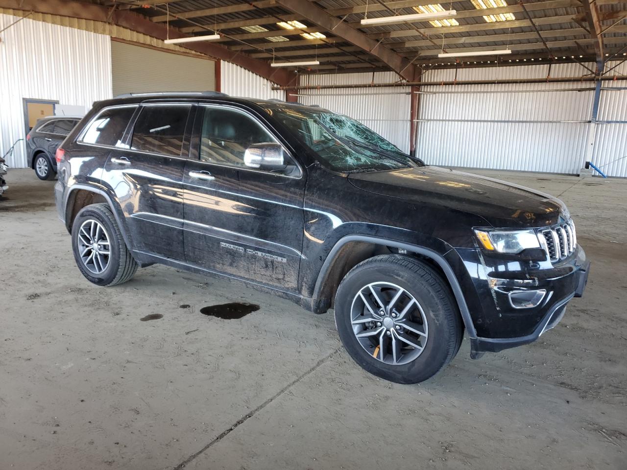 2018 Jeep Grand Cherokee VIN 1C4RJFBT5JC297233 Copart auction photo, top/roof damage thumbnail 4