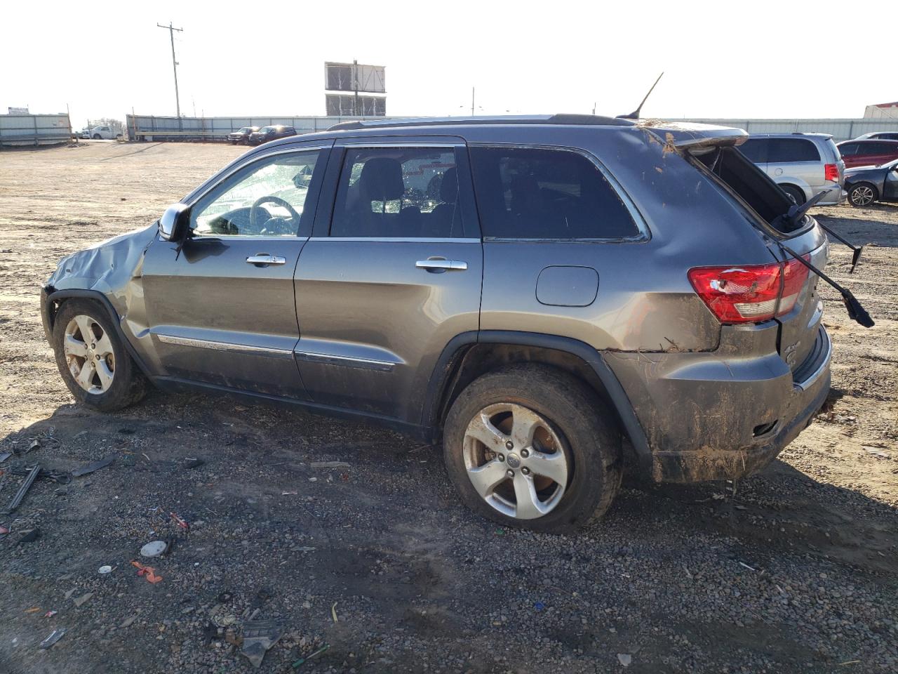 2013 Jeep Grand Cherokee VIN 1C4RJFCG0DC607214 Copart auction photo, rollover damage thumbnail 2