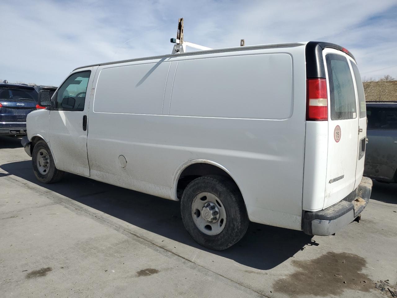 2015 Chevrolet Express VIN 1GCWGFCG3F1196195 Copart auction photo, front end / hail damage thumbnail 2