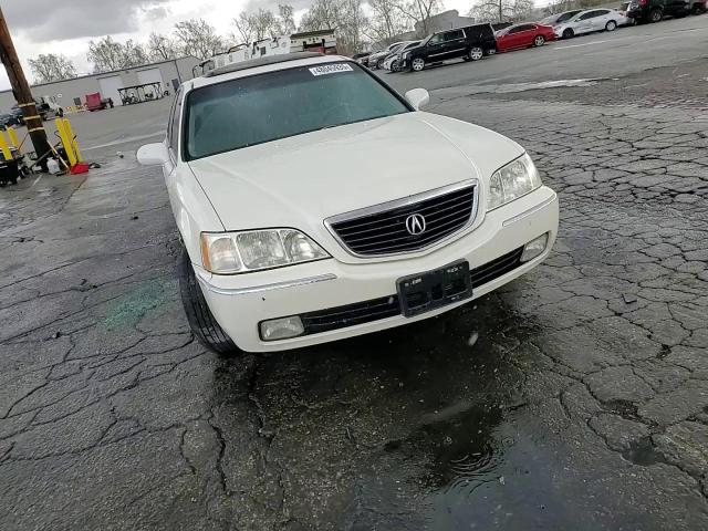 2001 Acura RL VIN JH4KA96671C001294 Copart auction photo, rear end damage thumbnail 10