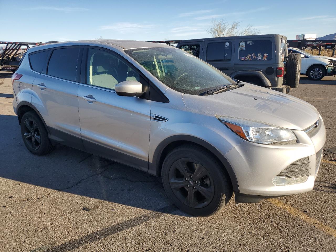 2015 Ford Escape VIN 1FMCU0G96FUA26217 Copart auction photo, rear end damage thumbnail 4