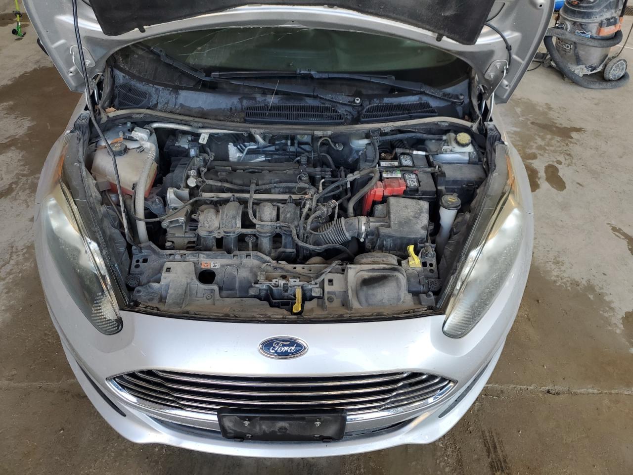 2017 Ford Fiesta VIN 3FADP4EJ0HM150484 Copart auction photo, side / hail damage thumbnail 12