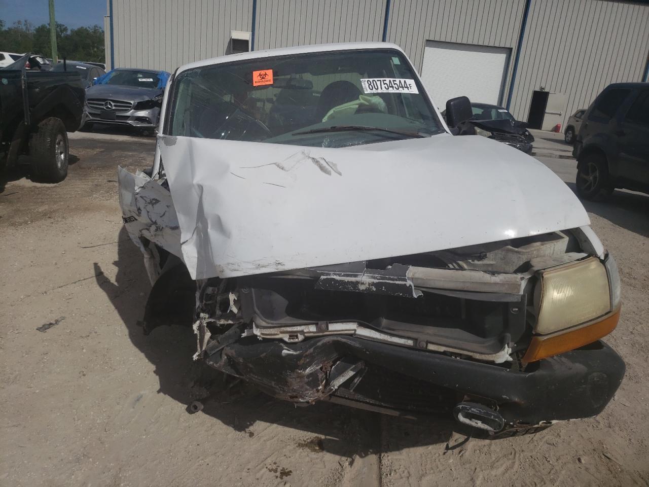 1999 Ford Ranger VIN 1FTYR10C9XUB80185 Copart auction photo, front end / side damage thumbnail 5