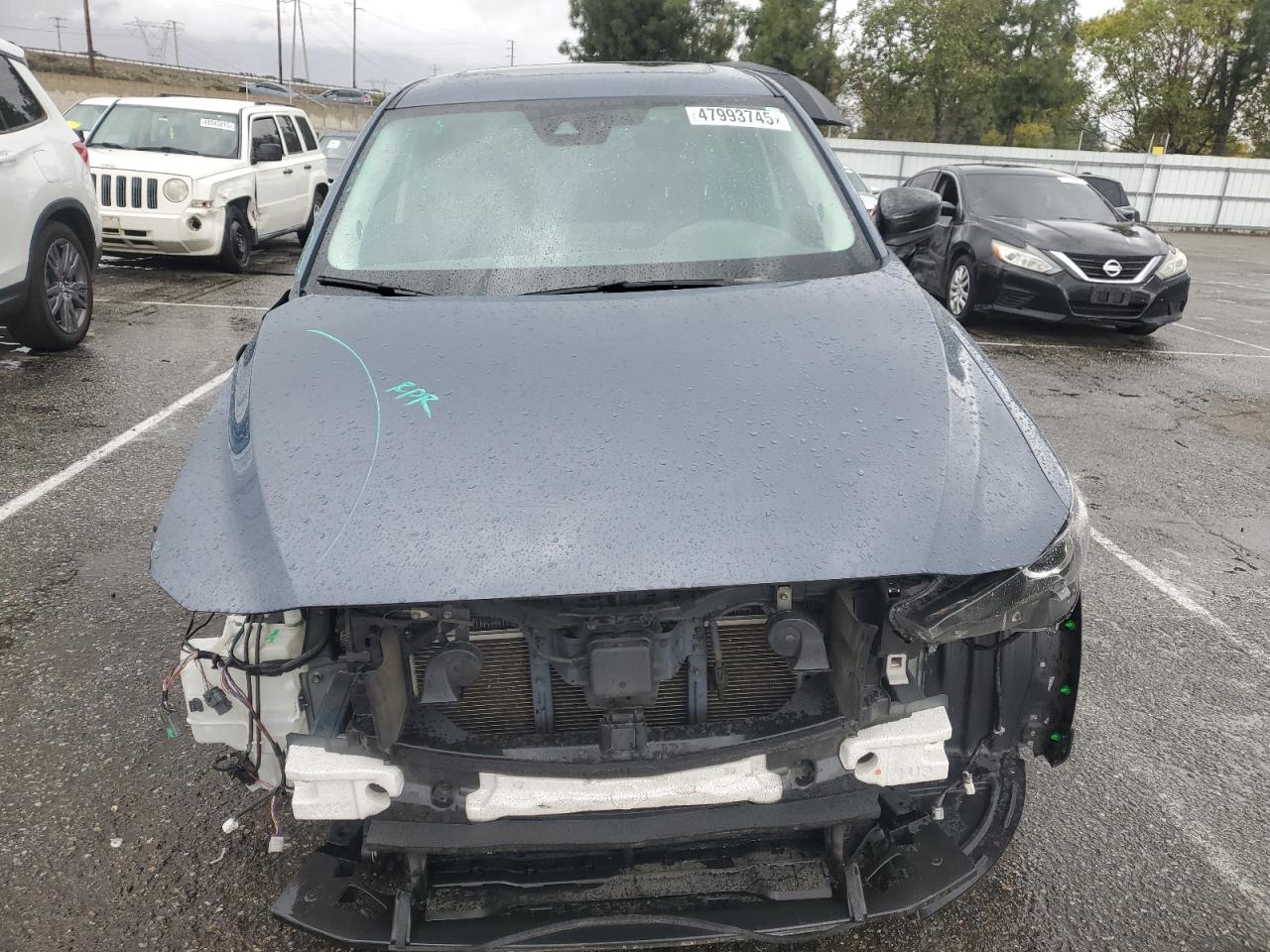 2021 Mazda CX-5 VIN JM3KFACM3M0420425 Copart auction photo, front end damage thumbnail 5
