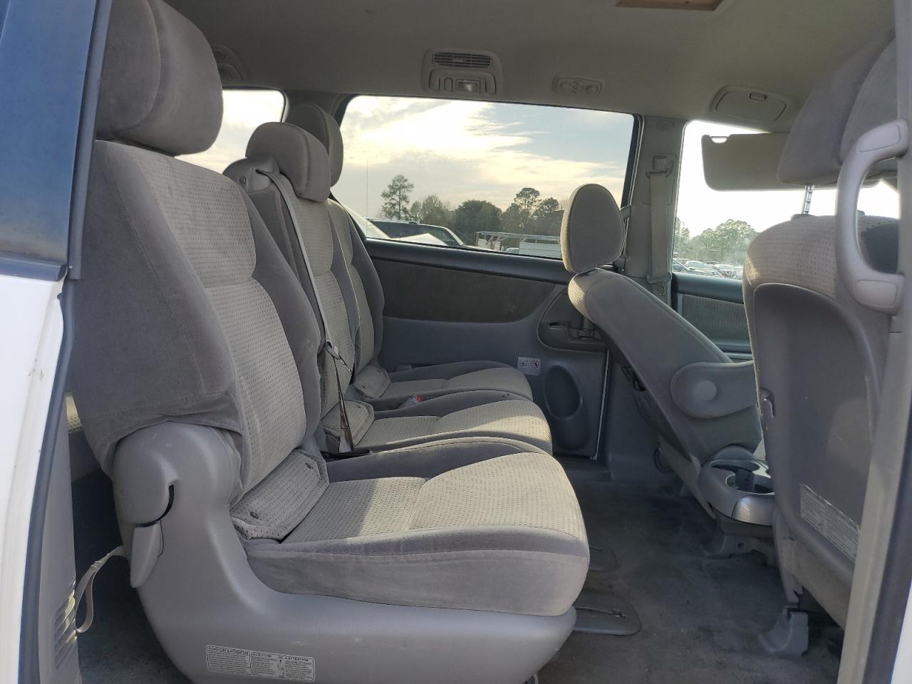 2010 Toyota Sienna VIN 5TDKK4CC4AS340444 Copart auction photo, front end / all over damage thumbnail 11