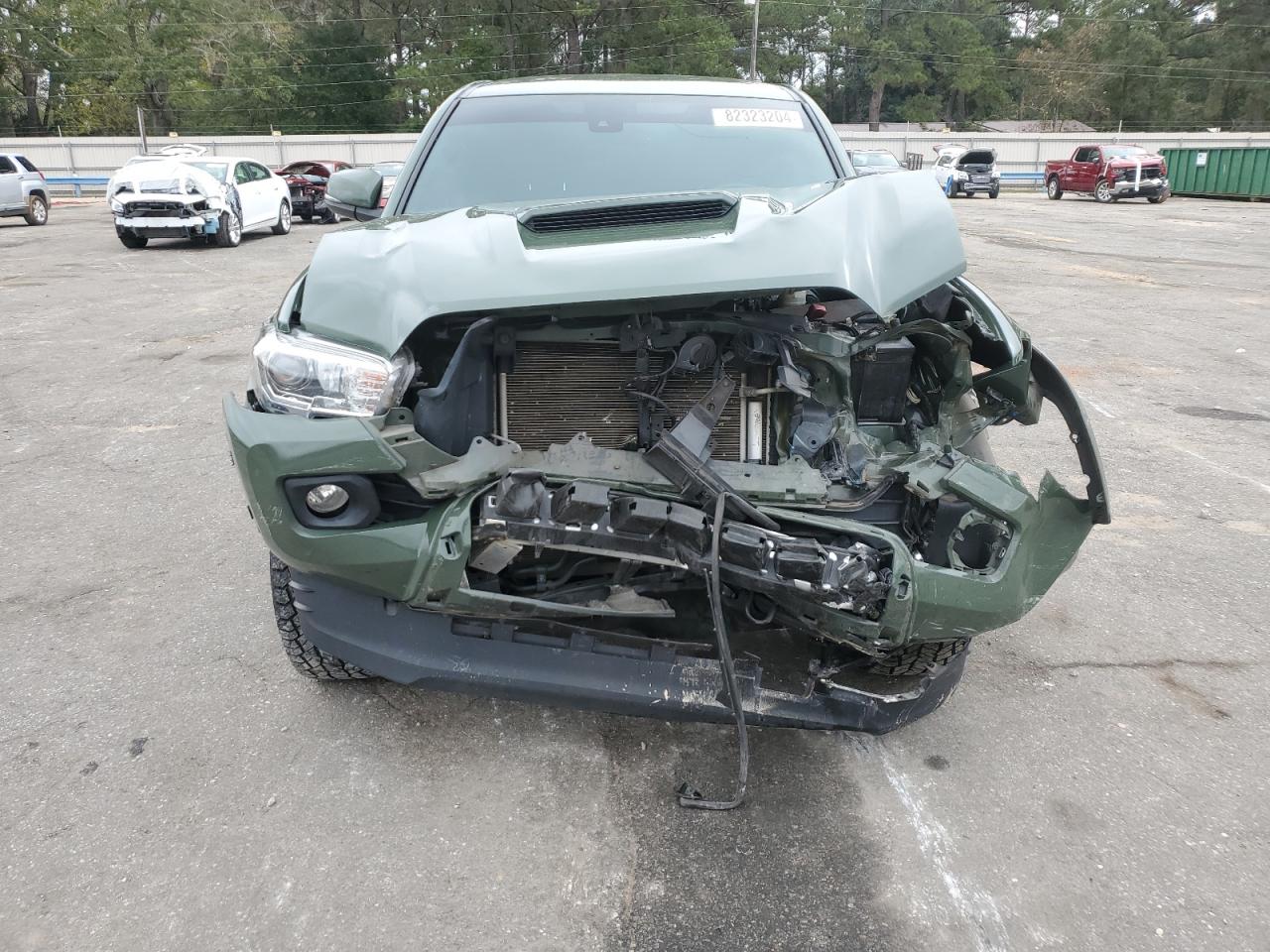 2021 Toyota Tacoma VIN 5TFAZ5CN2MX102069 Copart auction photo, front end damage thumbnail 5