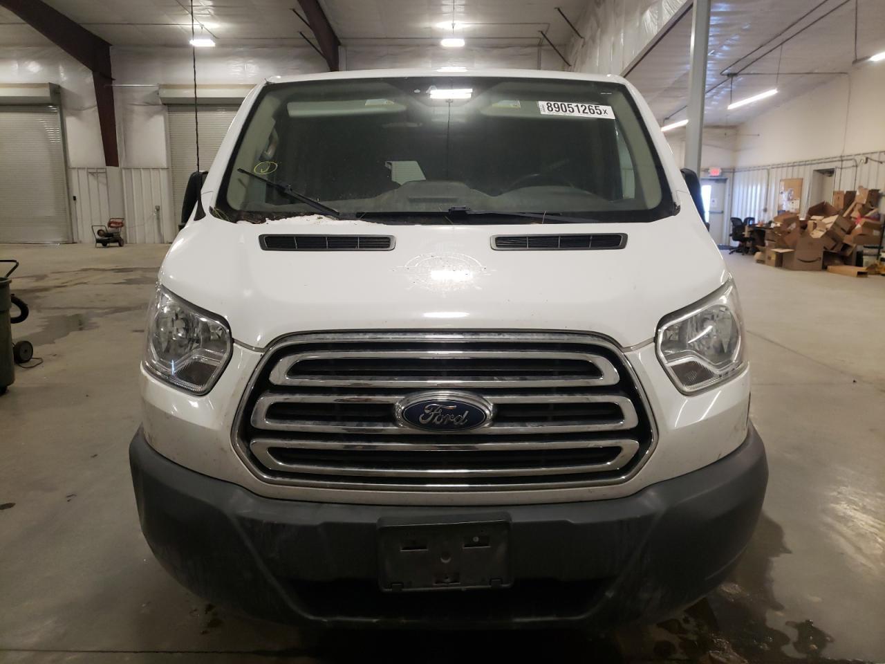2016 Ford Transit VIN 1FTYR2ZG4GKA07178 Copart auction photo, all over damage thumbnail 5