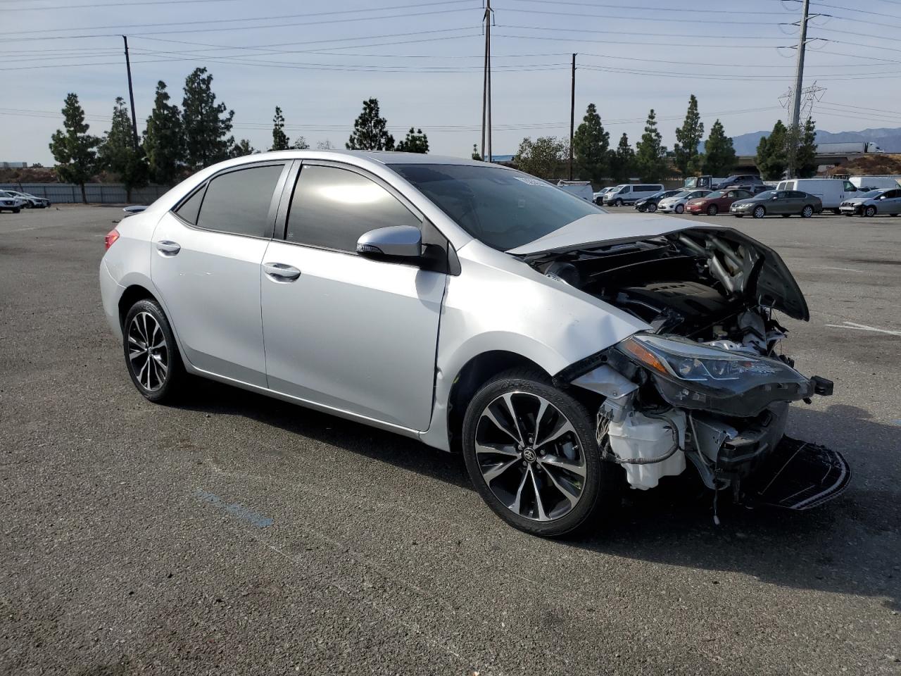 2017 Toyota Corolla VIN 2T1BURHE5HC761853 Copart auction photo, front end damage thumbnail 4