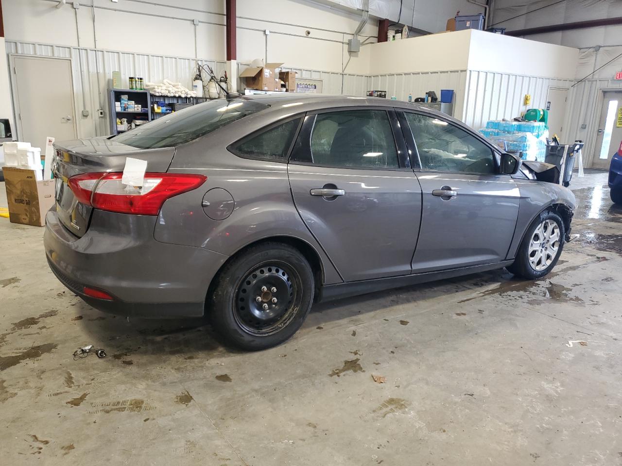 2012 Ford Focus VIN 1FAHP3F21CL463069 Copart auction photo, burn / front end damage thumbnail 3