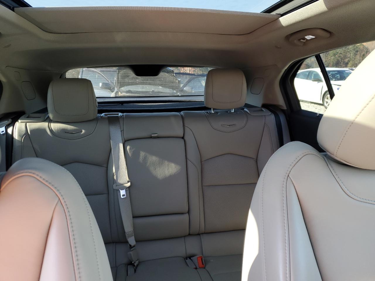 2019 Cadillac XT4 VIN 1GYFZCR42KF199831 Copart auction photo, front end / side damage thumbnail 10