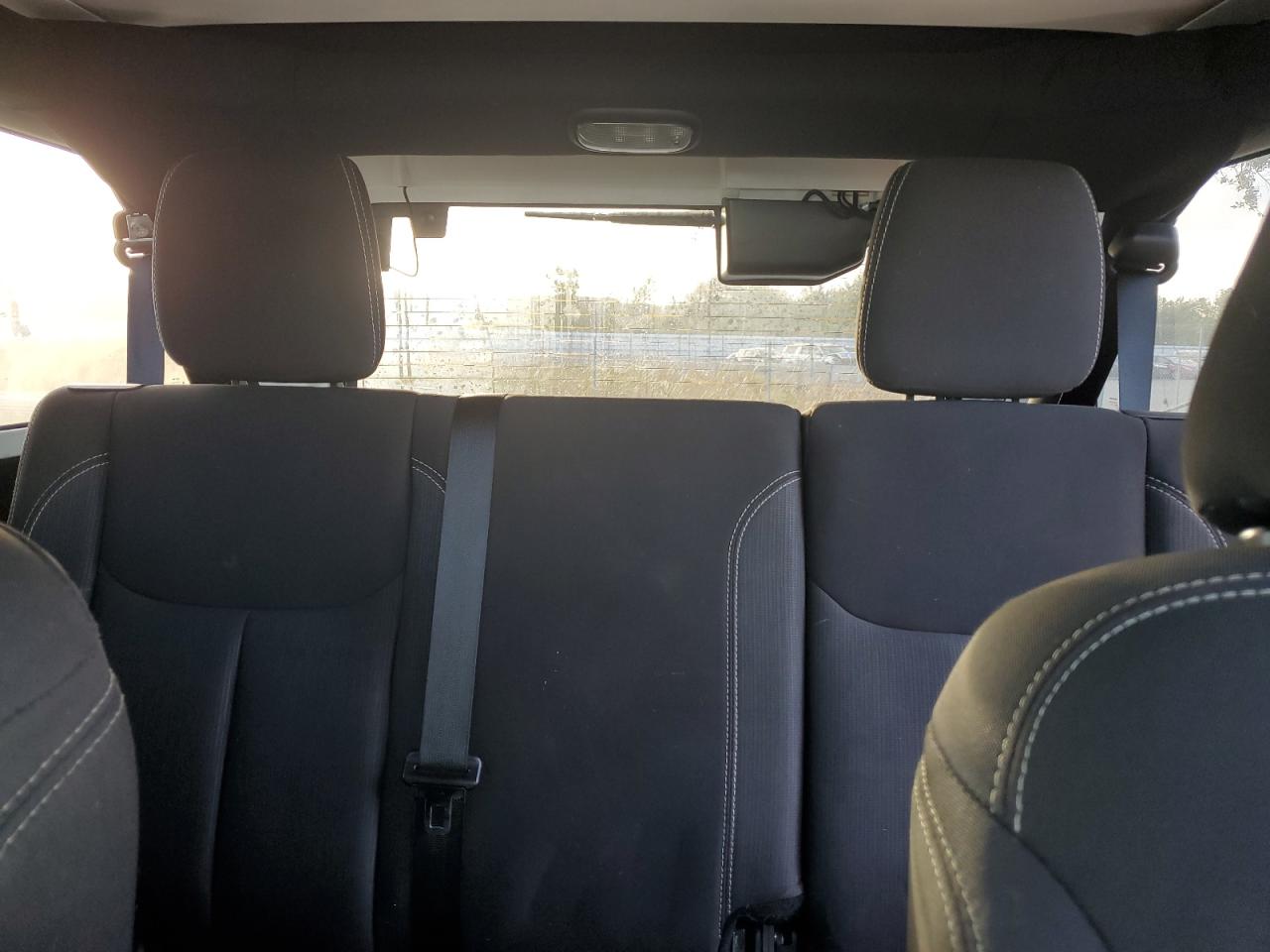 2015 Jeep Wrangler VIN 1C4BJWEGXFL614205 Copart auction photo, minor dent/scratches damage thumbnail 10