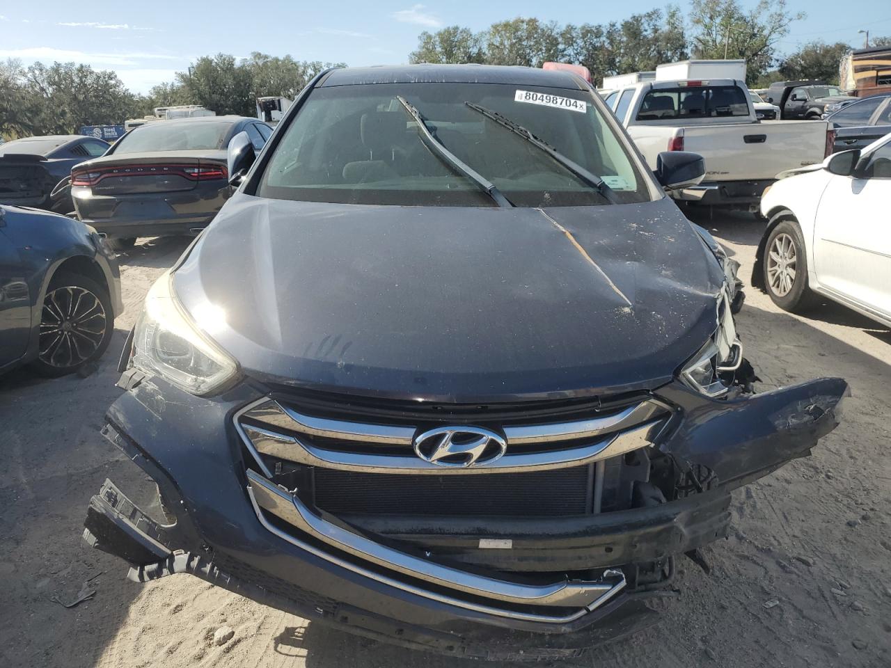 2015 Hyundai Santa Fe VIN 5XYZT3LB4FG282949 Copart auction photo, front end damage thumbnail 5