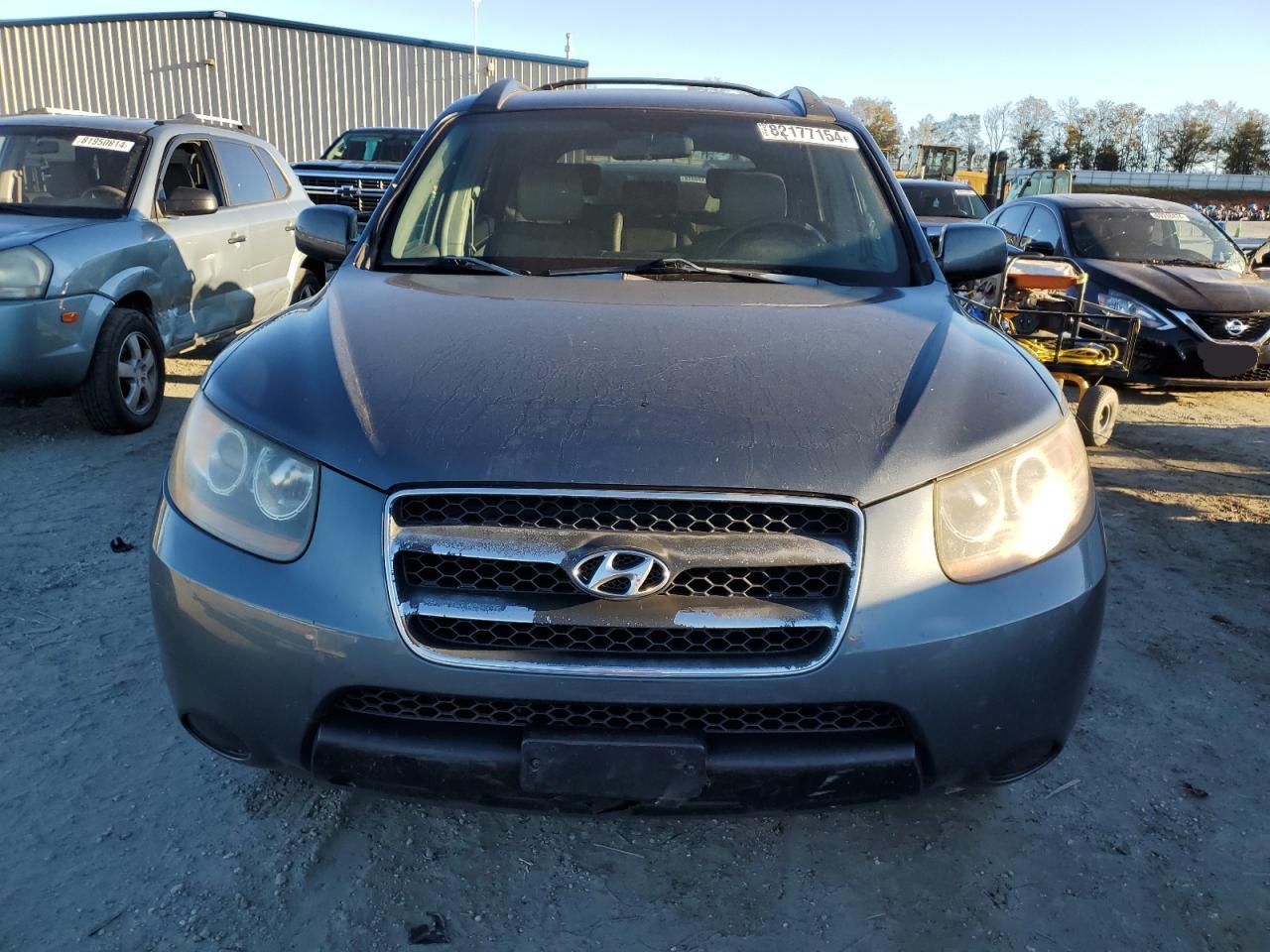 2007 Hyundai Santa Fe VIN 5NMSG13D47H110763 Copart auction photo, rear end damage thumbnail 5