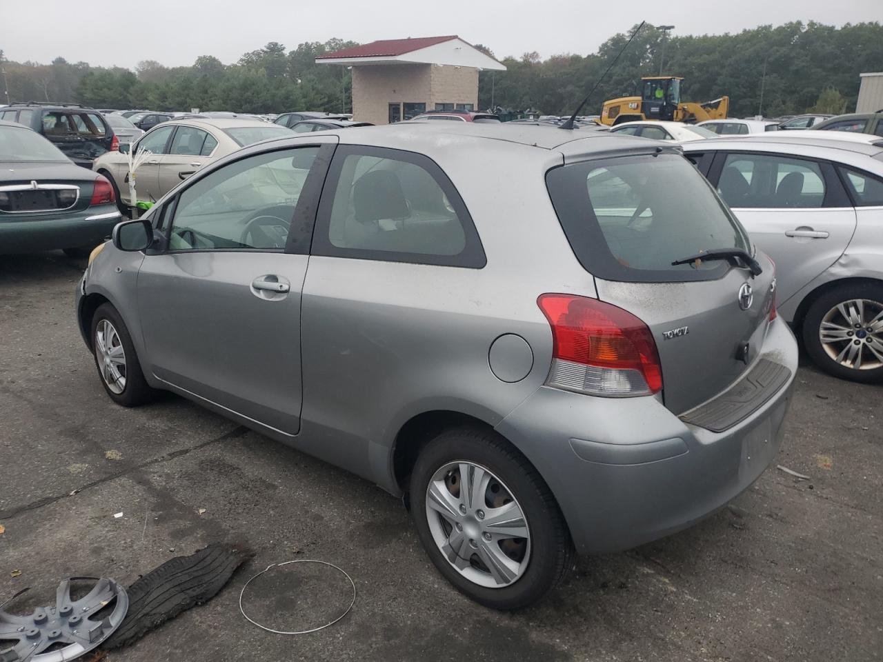 2010 Toyota Yaris VIN JTDJT4K36A5286810 Copart auction photo, side damage thumbnail 2