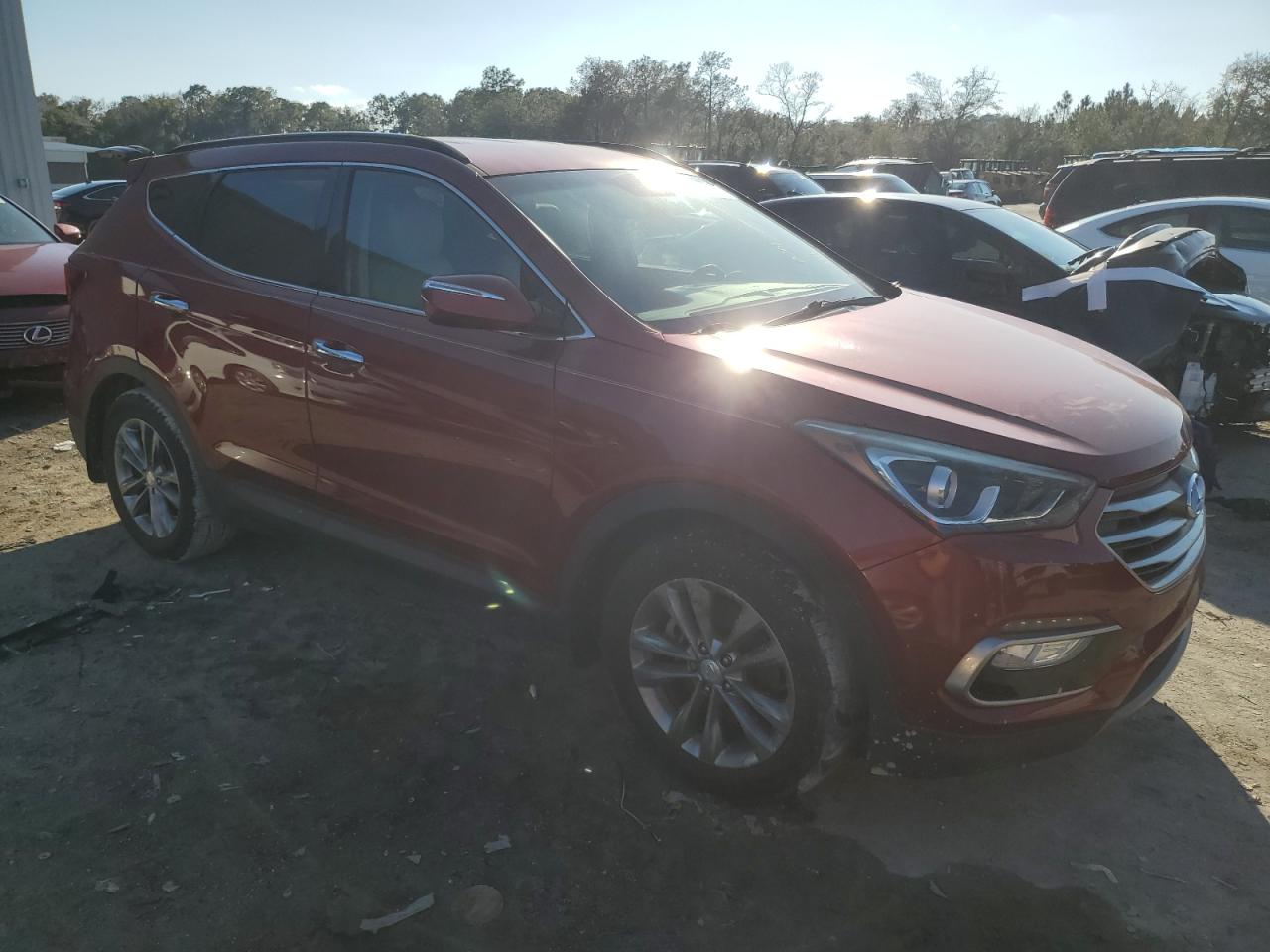 2017 Hyundai Santa Fe VIN 5XYZU4LA9HG425911 Copart auction photo, minor dent/scratches damage thumbnail 4