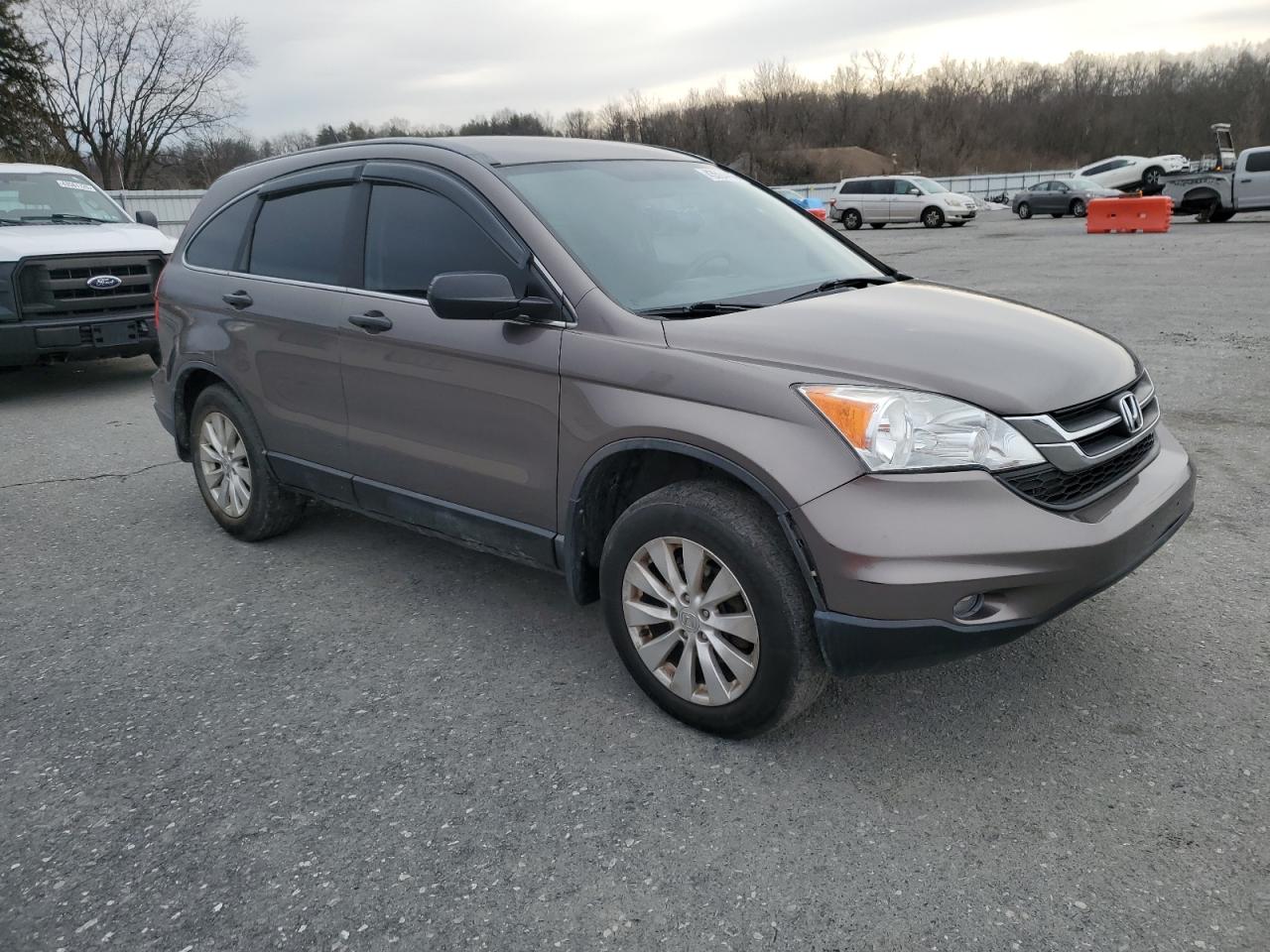2011 Honda CR-V VIN 5J6RE4H33BL058470 Copart auction photo, side damage thumbnail 4