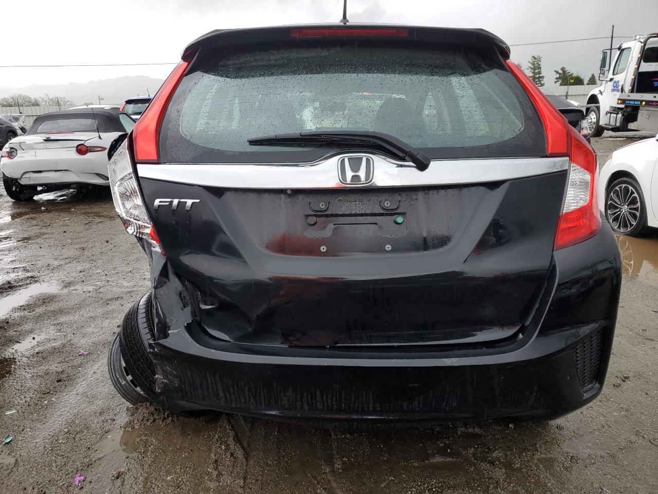 2015 Honda Fit VIN 3HGGK5H81FM780159 Copart auction photo, rear end / side damage thumbnail 6