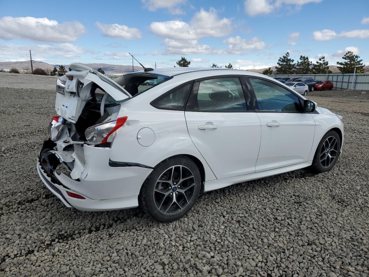 2016 Ford Focus VIN 1FADP3F21GL397479 Copart auction photo, rear end / minor dent/scratches damage thumbnail 3