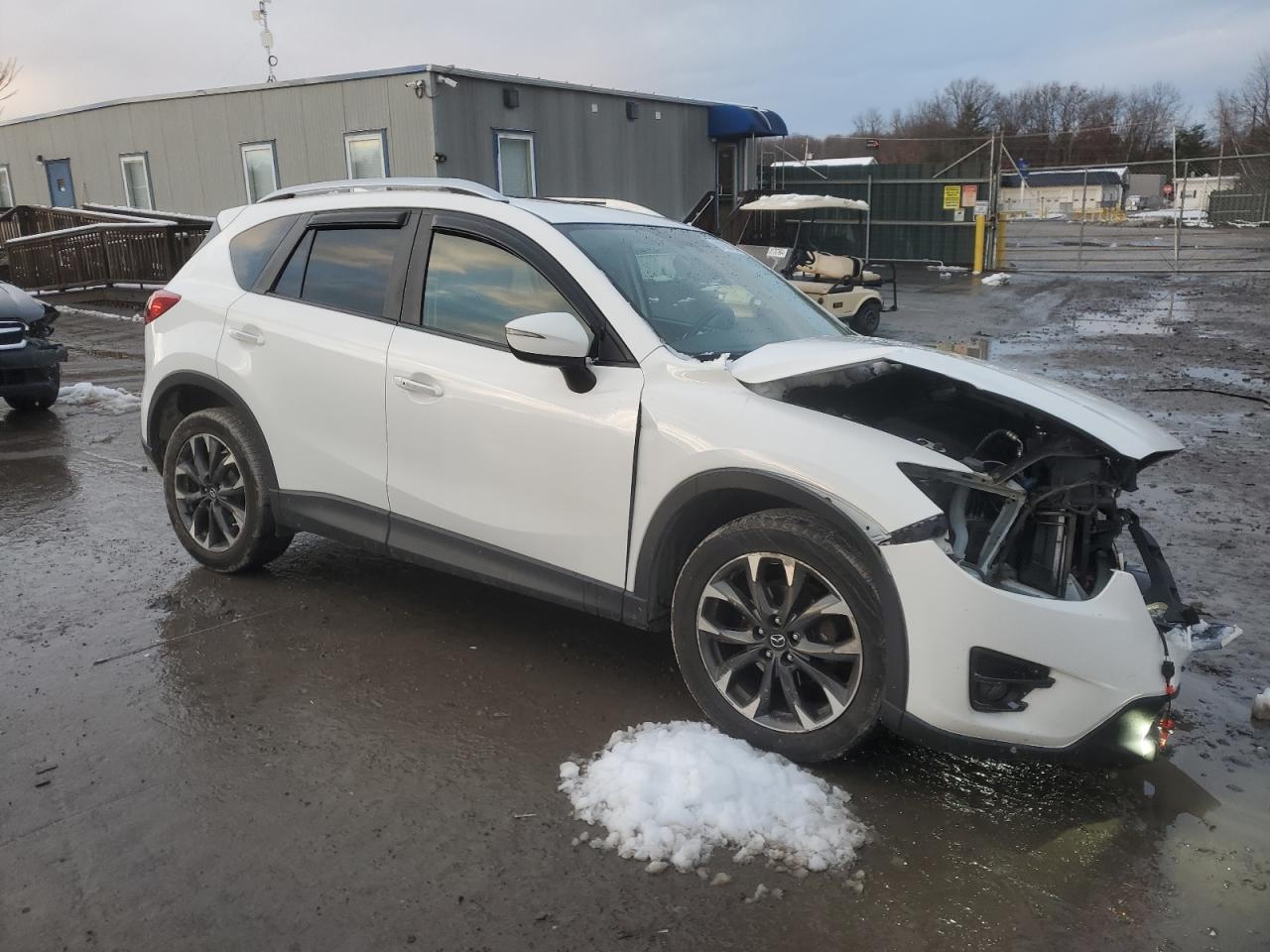2016 Mazda CX-5 VIN JM3KE4DY3G0655613 Copart auction photo, front end damage thumbnail 4