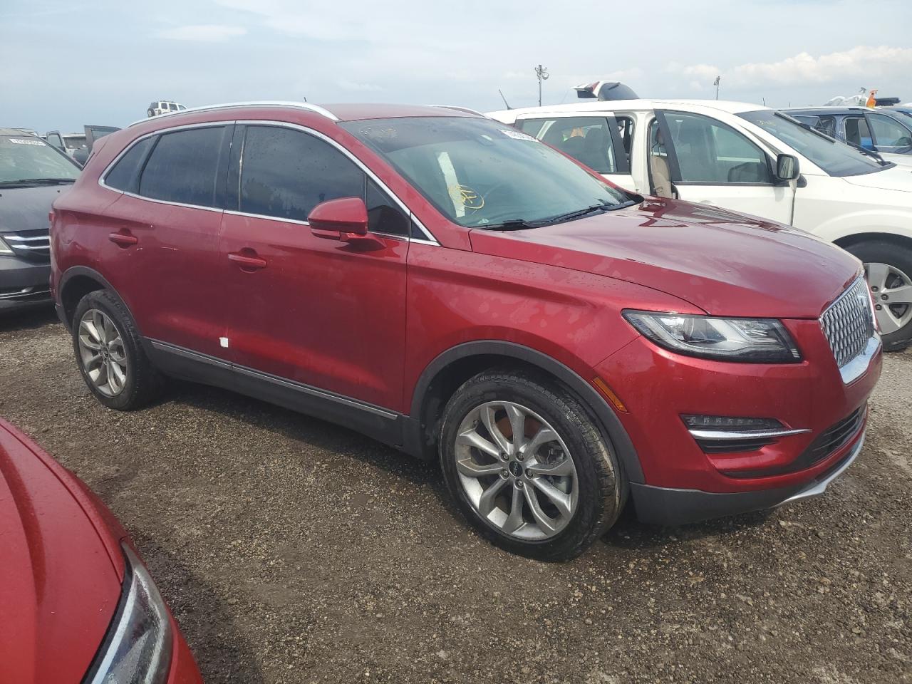 2019 Lincoln MKC VIN 5LMCJ2D94KUL07299 Copart auction photo, water/flood damage thumbnail 4