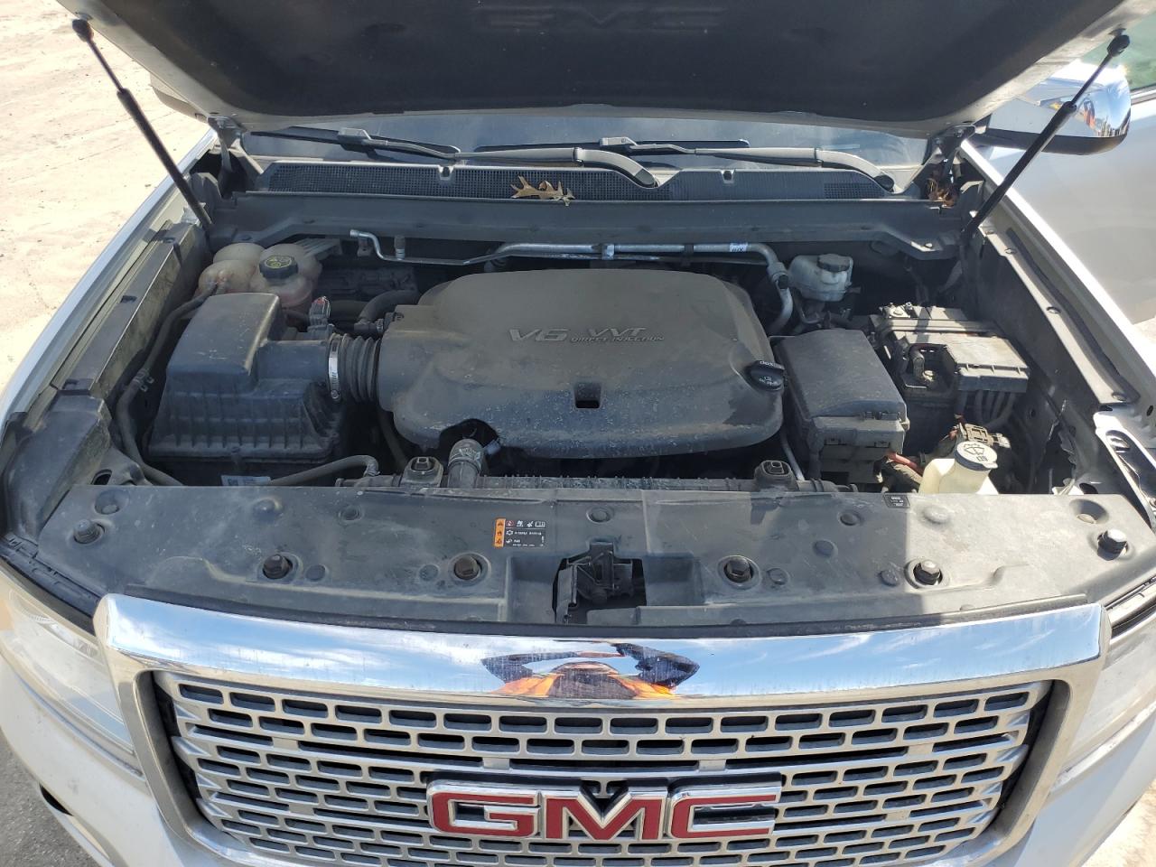2018 GMC Canyon VIN 1GTG5EEN0J1166564 Copart auction photo, side / hail damage thumbnail 11