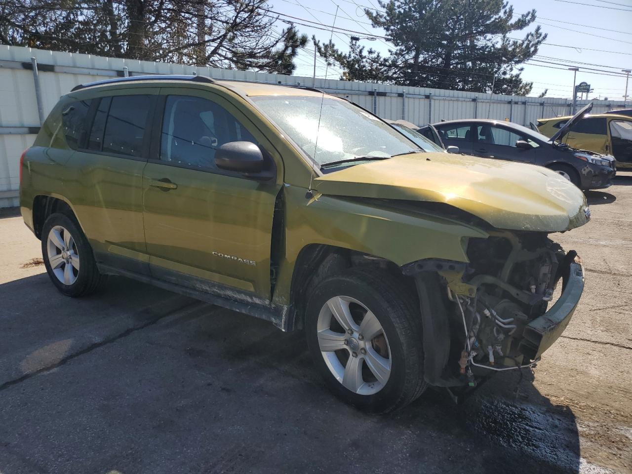 2012 Jeep Compass VIN 1C4NJCBA0CD556901 Copart auction photo, front end damage thumbnail 4