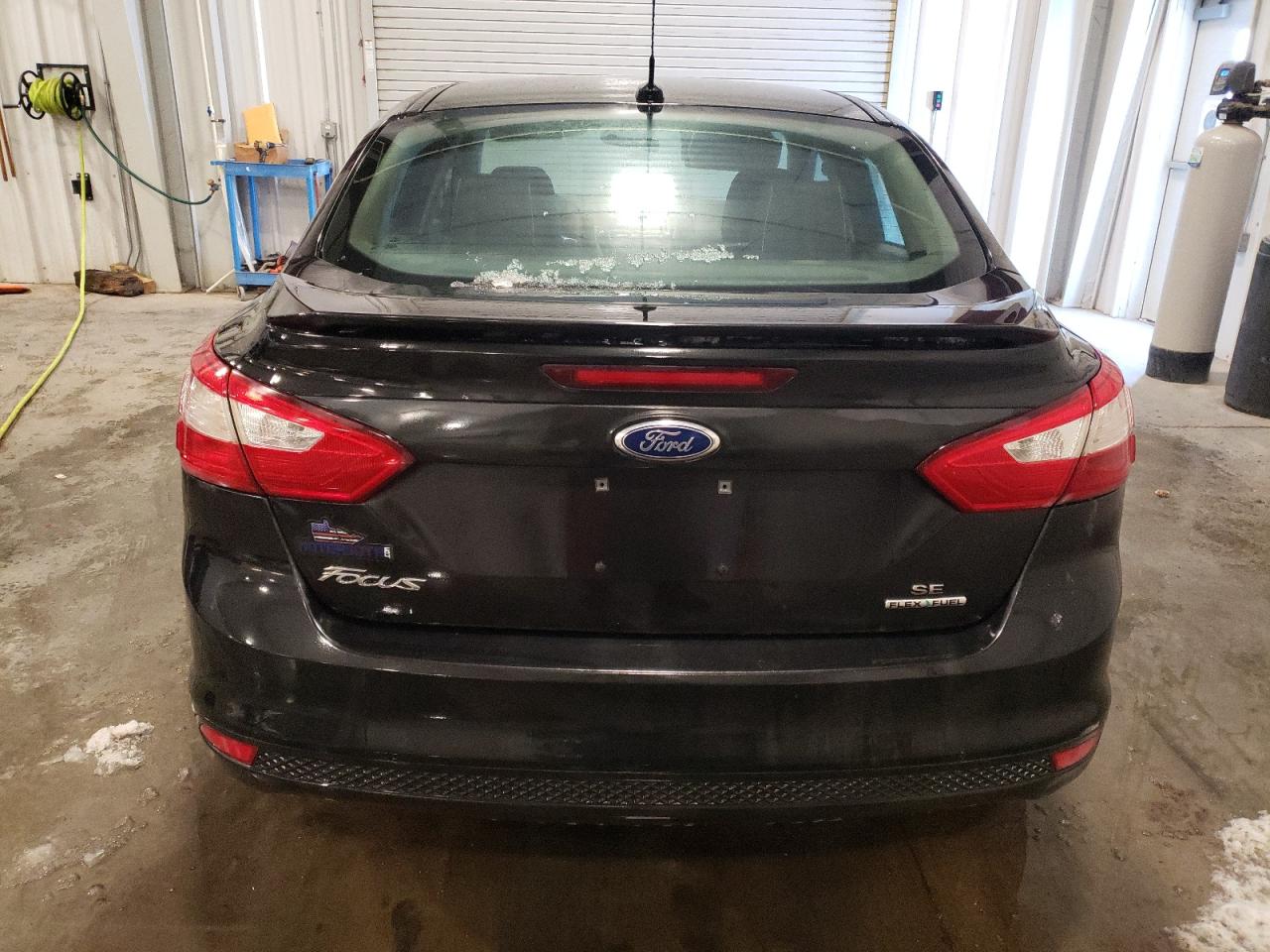 2012 Ford Focus VIN 1FAHP3F21CL476677 Copart auction photo, front end / hail damage thumbnail 6