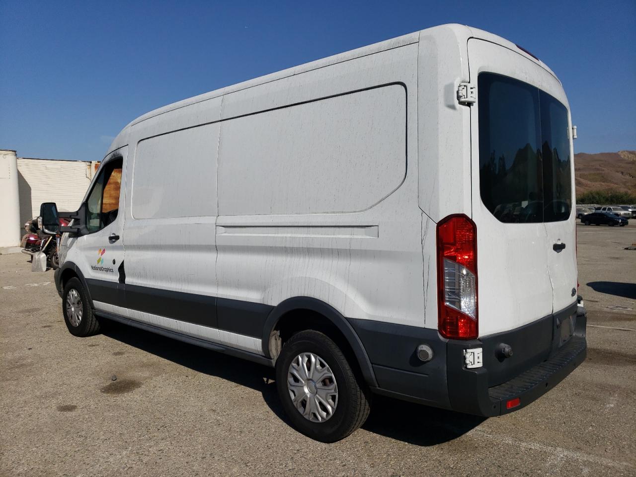 2015 Ford Transit VIN 1FTNR2CG4FKA09250 Copart auction photo, burn damage thumbnail 2