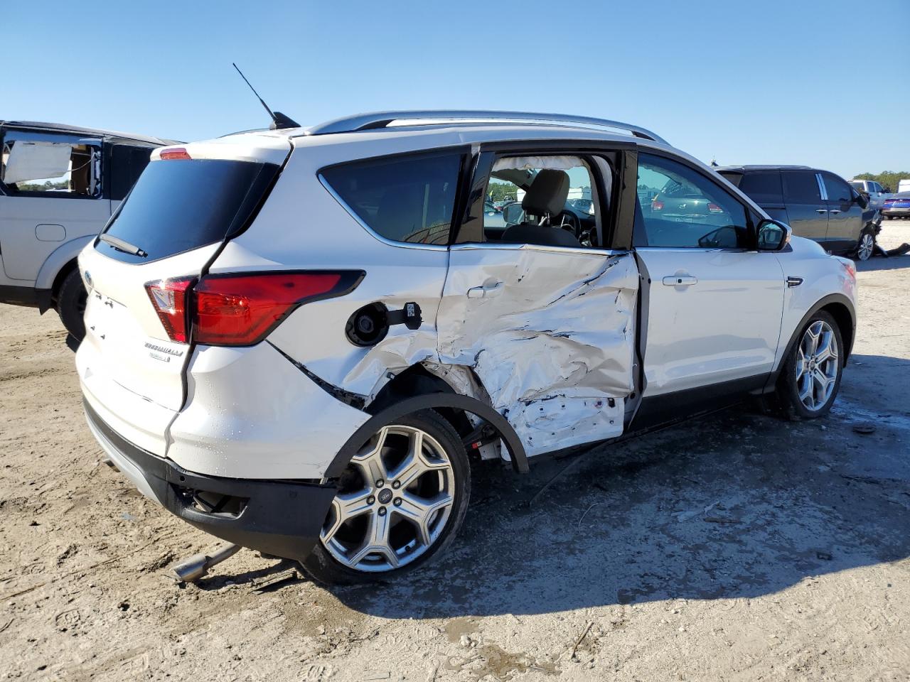 2019 Ford Escape VIN 1FMCU0J94KUA50566 Copart auction photo, side damage thumbnail 3