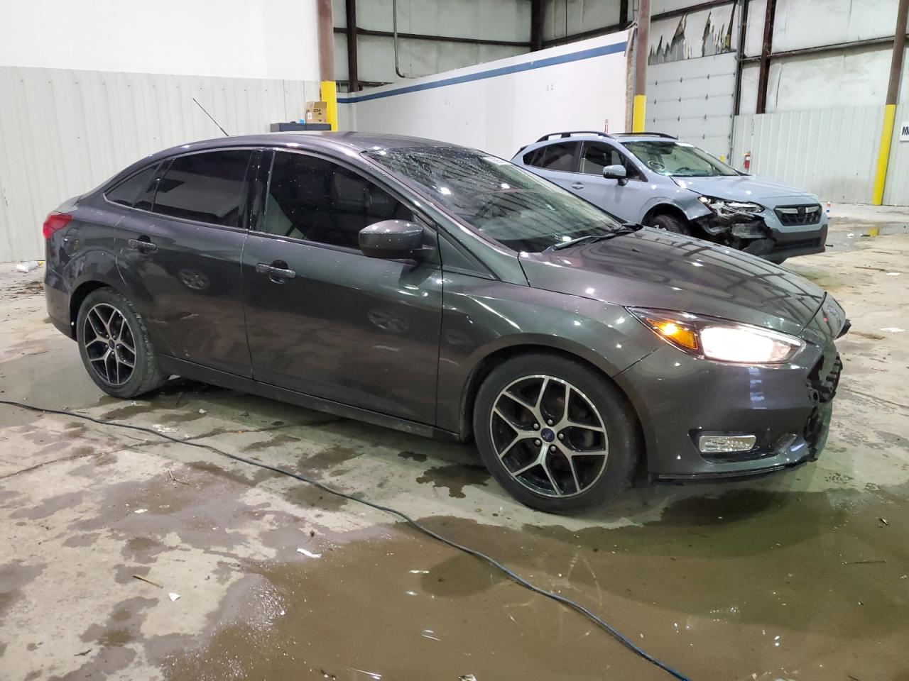 2018 Ford Focus VIN 1FADP3F27JL307713 Copart auction photo, front end damage thumbnail 4
